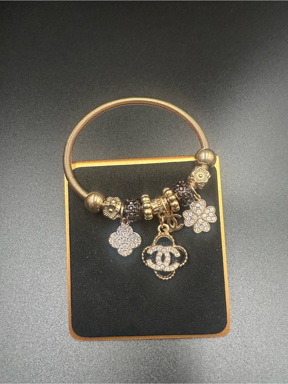 Gold-Tone Charm Bracelet with Crystal Clover and Logo-Inspired Pendant